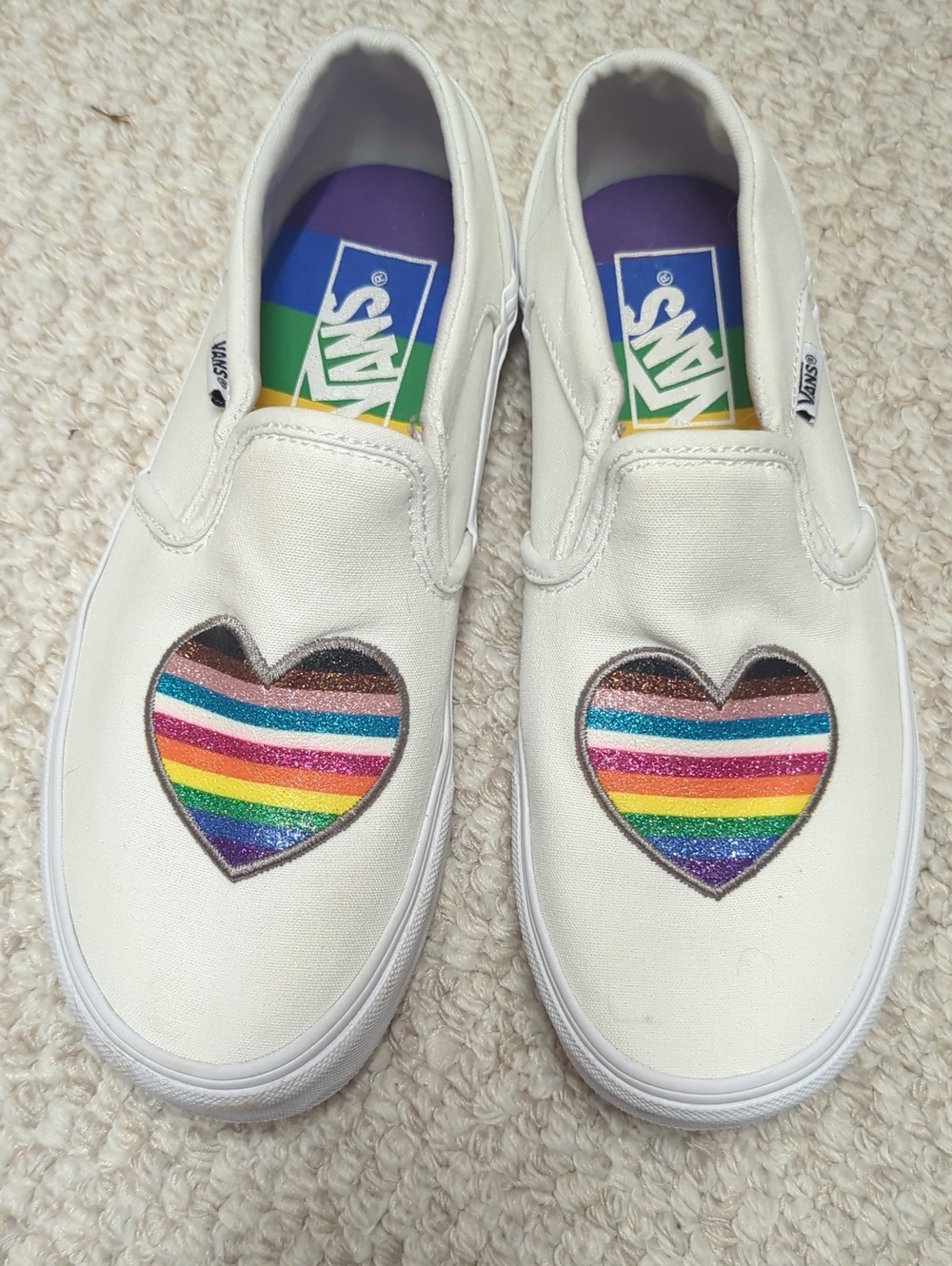 Vans Kids White Slip-On Sneakers with Rainbow Heart Stripes